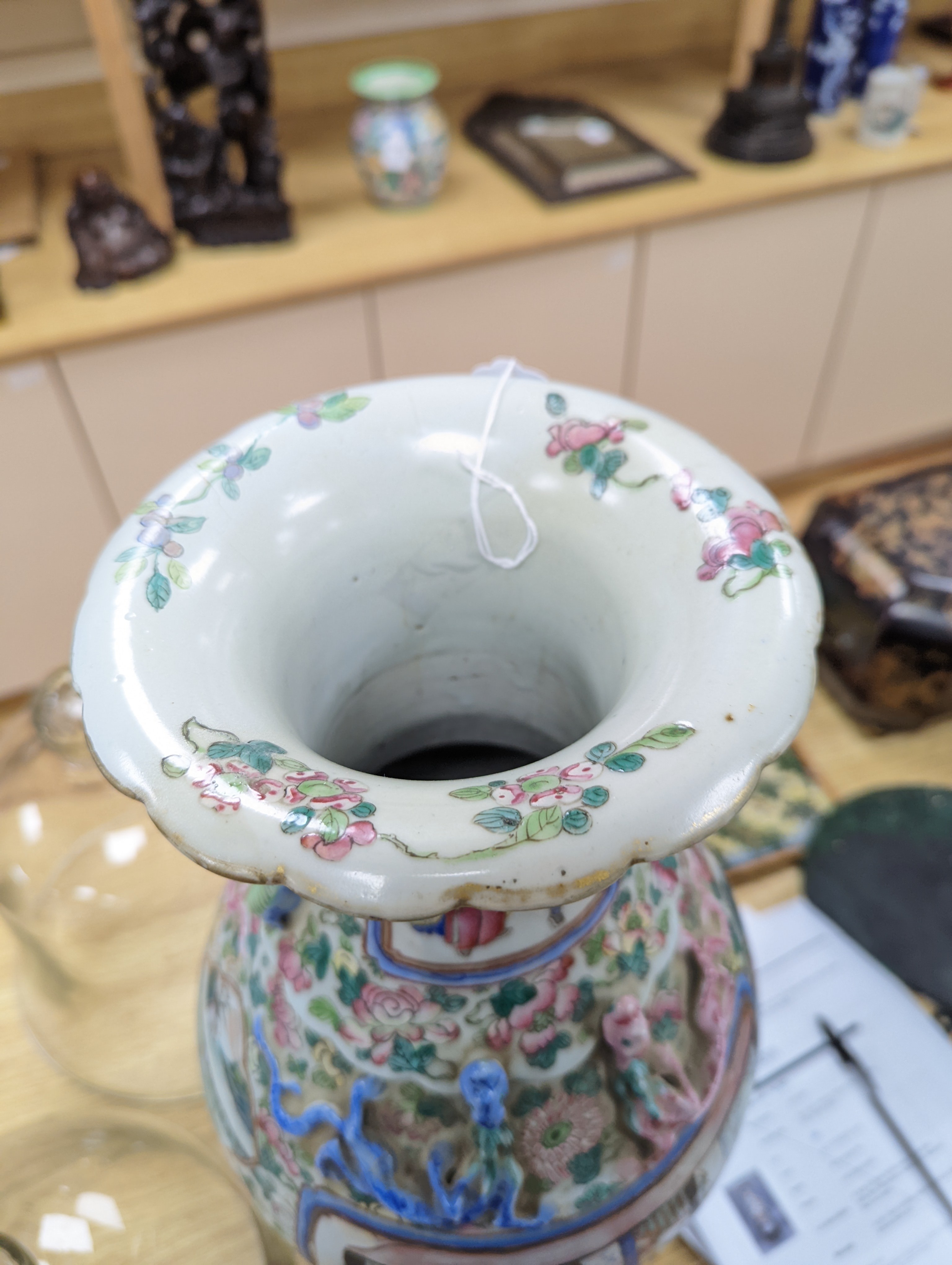 A large Chinese famille rose two handled vase, late 19th century, wood stand, restored 54cm incl stand